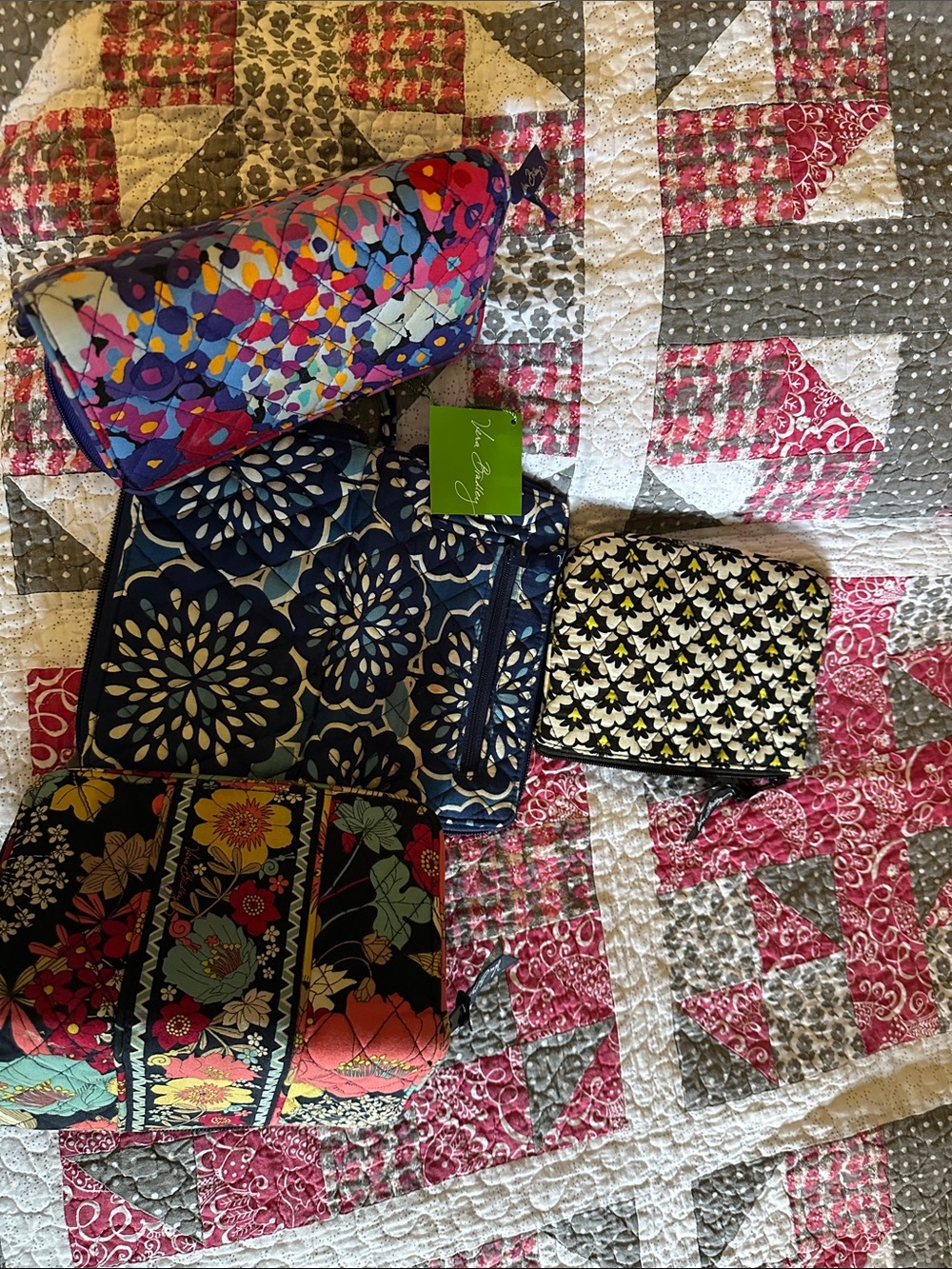 Vera Bradley Mixed Pattern Quilted wallets  in Navy, Pink, Yellow.